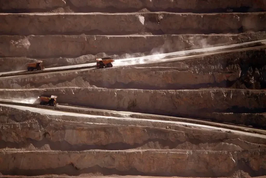 Haul trucks at the Escondida copper mine in the Atacama Desert, Chile