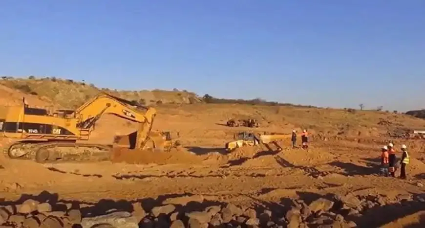 Excavator working a diamond field in Zimbabwe